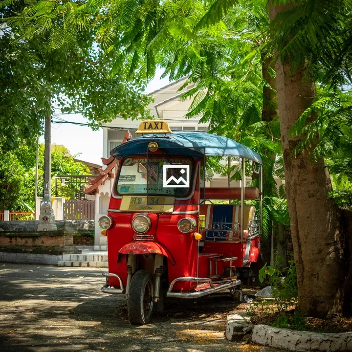 Tuk-tuk in temple courtyard