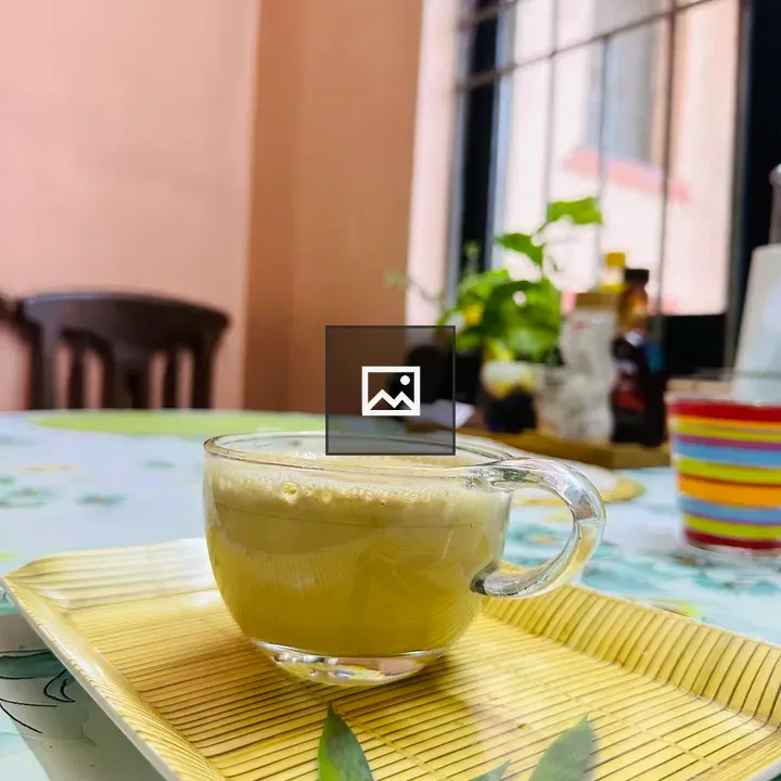 Cup of coffee on kitchen table