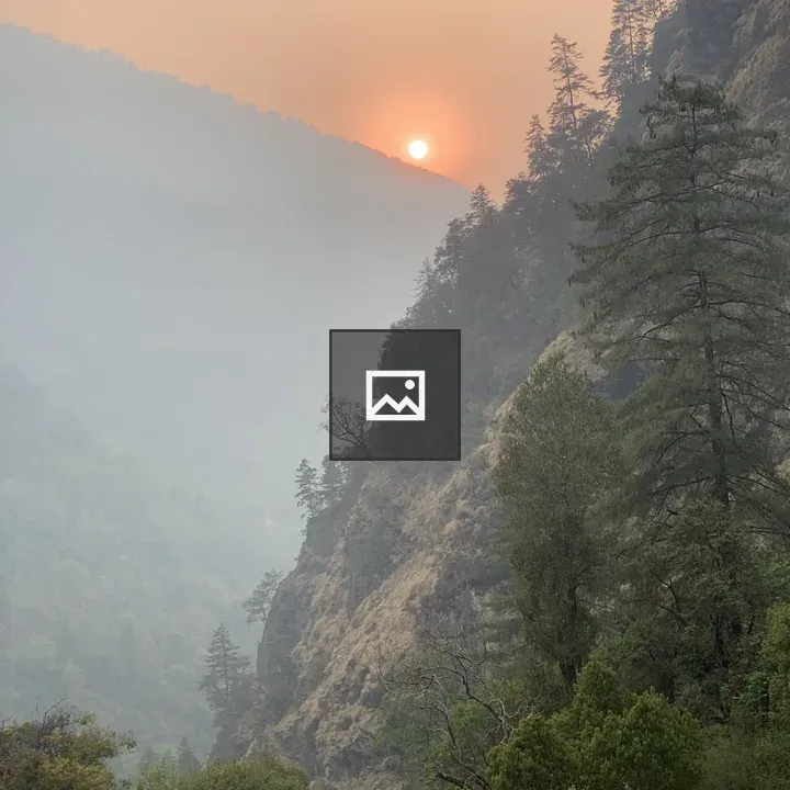 Sunset over green hills near Dhunche