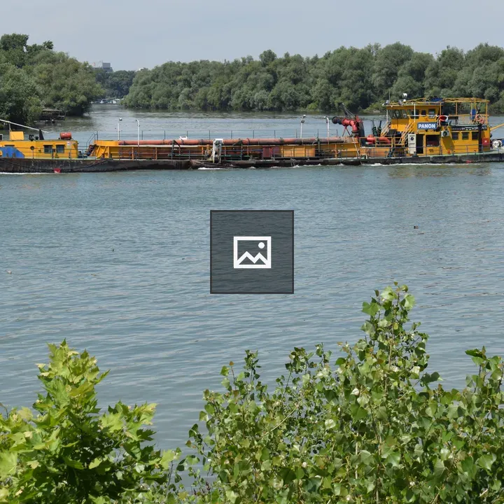 Barge on River with Trees