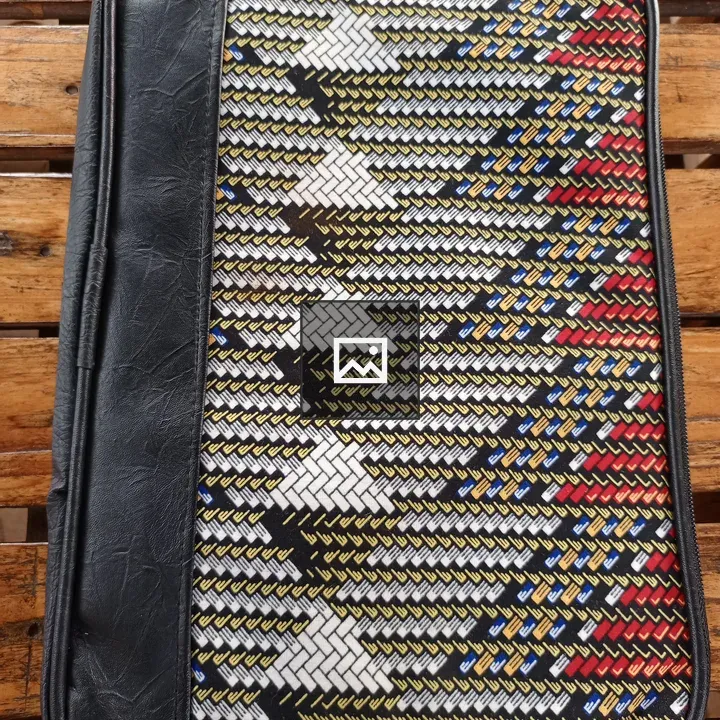 Laptop sleeve with geometric fabric