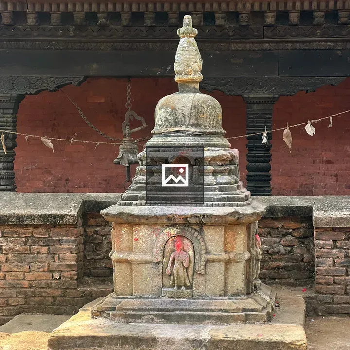 Ancient stone stupa in courtyard