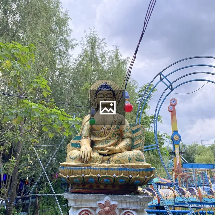 Golden Buddha Statue on Pedestal