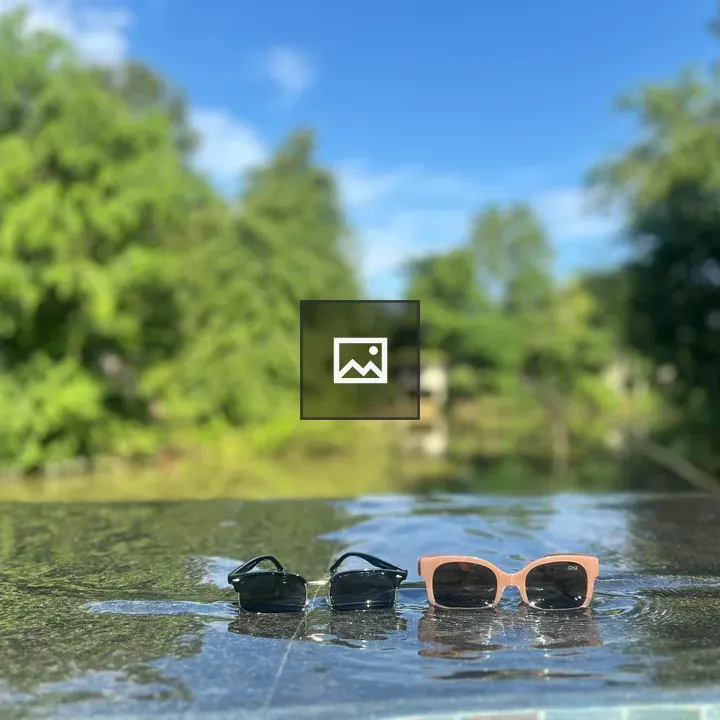 Sunglasses by Pool Edge