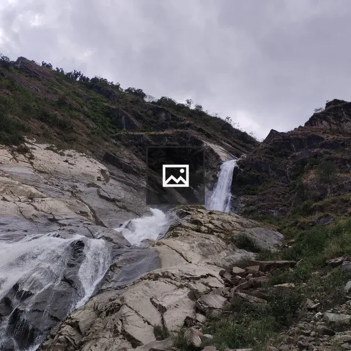 Waterfall on rocky hillside
