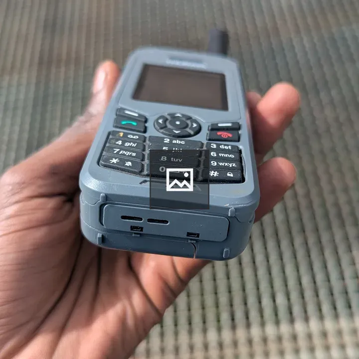 Hand Holding Satellite Phone