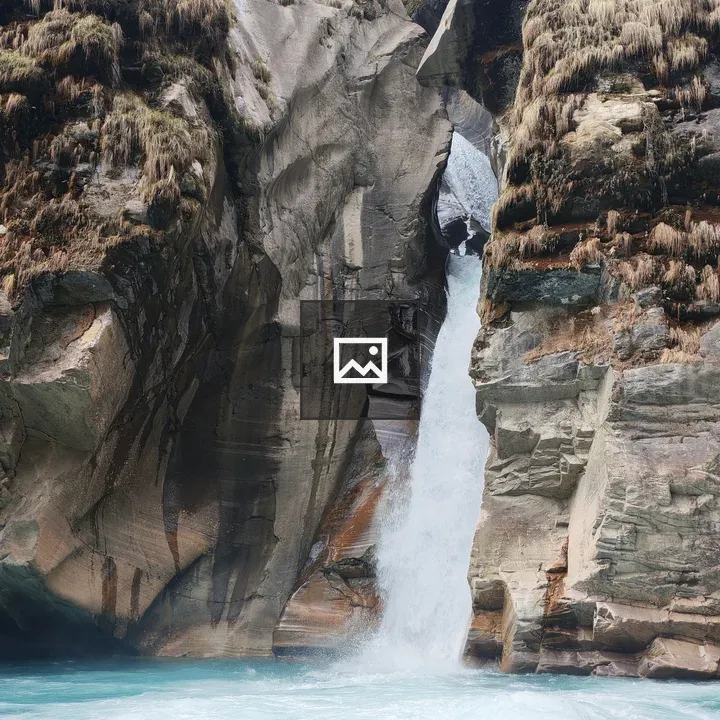 Waterfall in mossy canyon