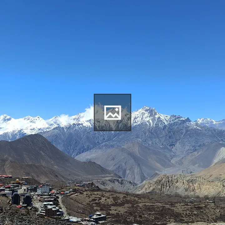Mountains with Snow and Blue Sky