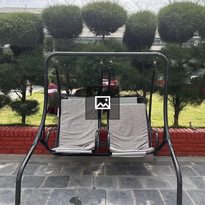 Metal-framed outdoor swing seat