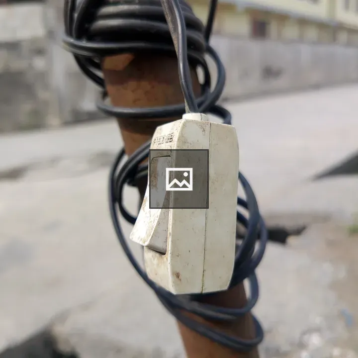 Weathered electrical switch on pole