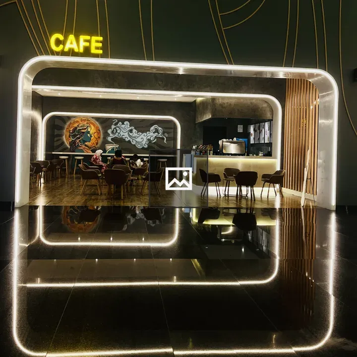 Cafe interior with neon doorway