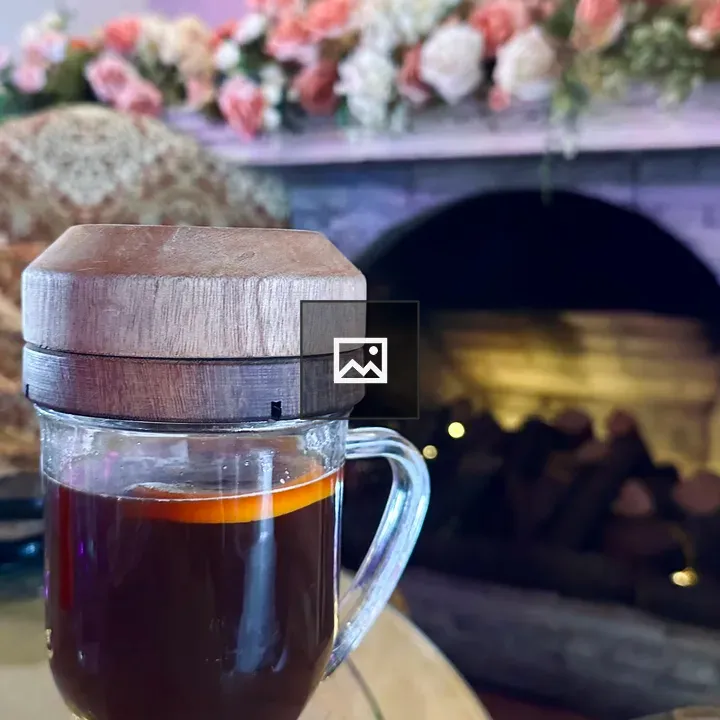 Smoked orange coffee in glass mug