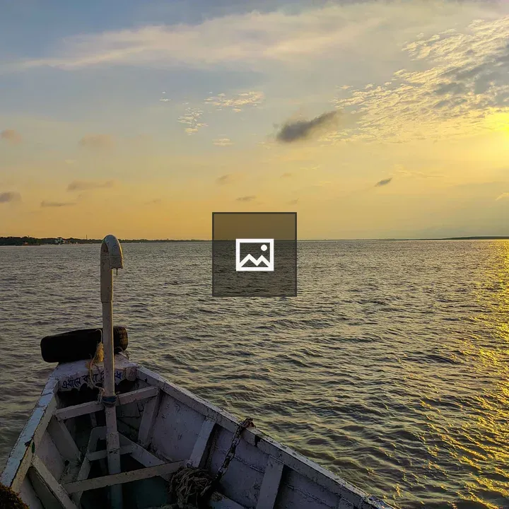 Calm River at Sunset from a Boat