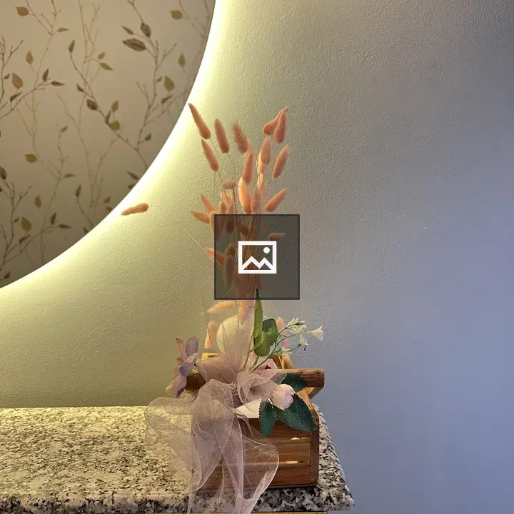 Decorative flower arrangement in wooden box