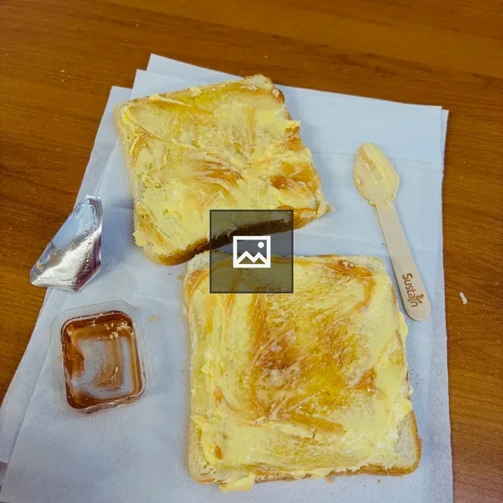 Toast with butter on napkin