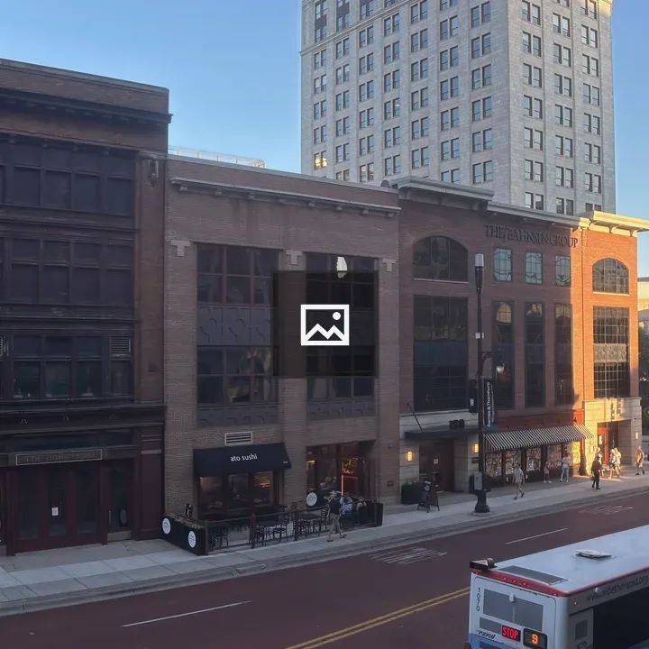 City street scene with pedestrians and vehicles