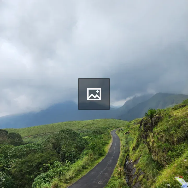 Narrow mountain road at dusk