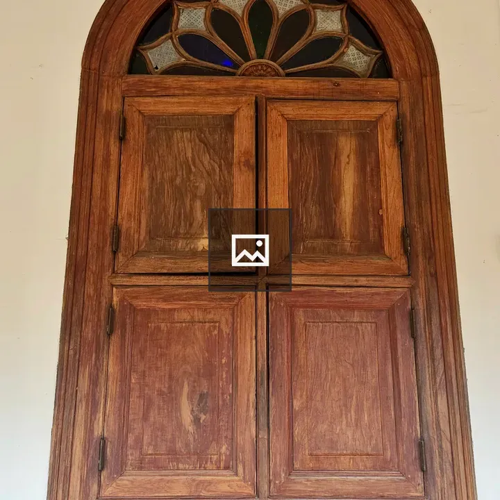 Wooden arched window