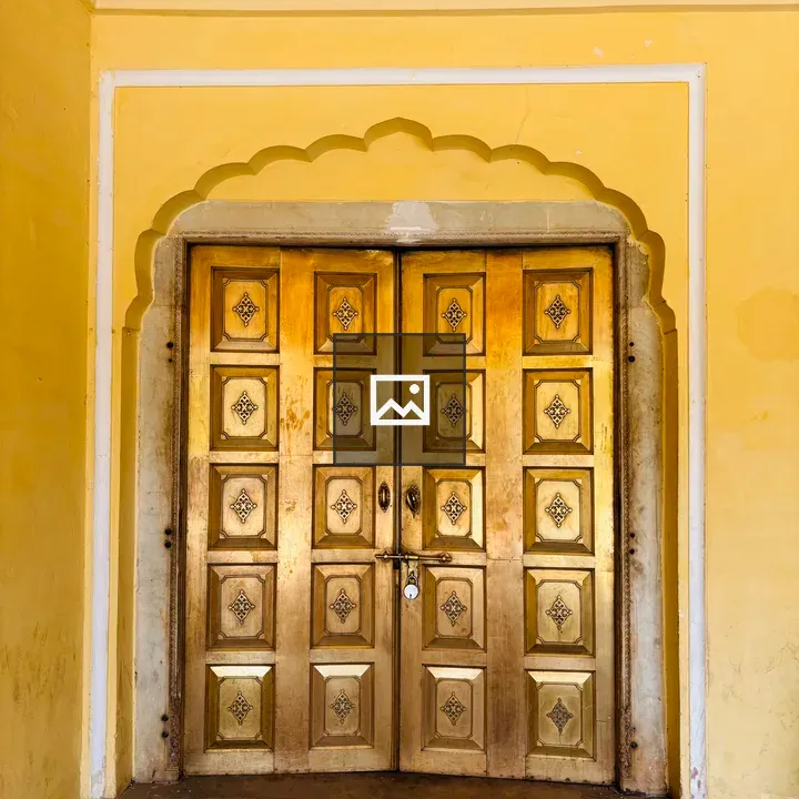 Ornate golden wooden doors