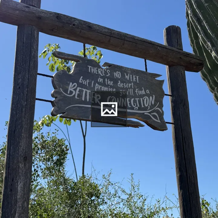 Wooden sign in desert
