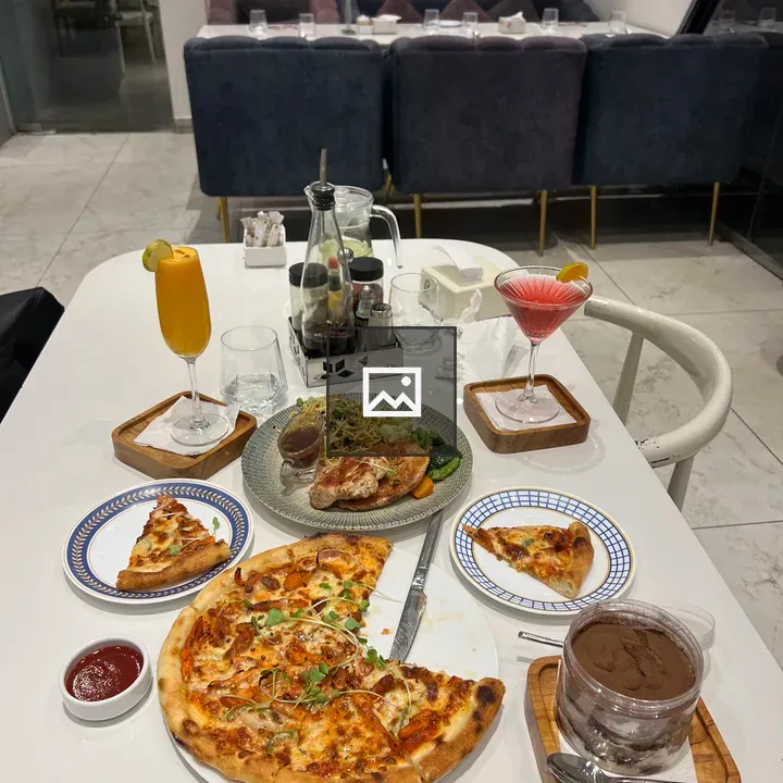 Dining table with assorted dishes