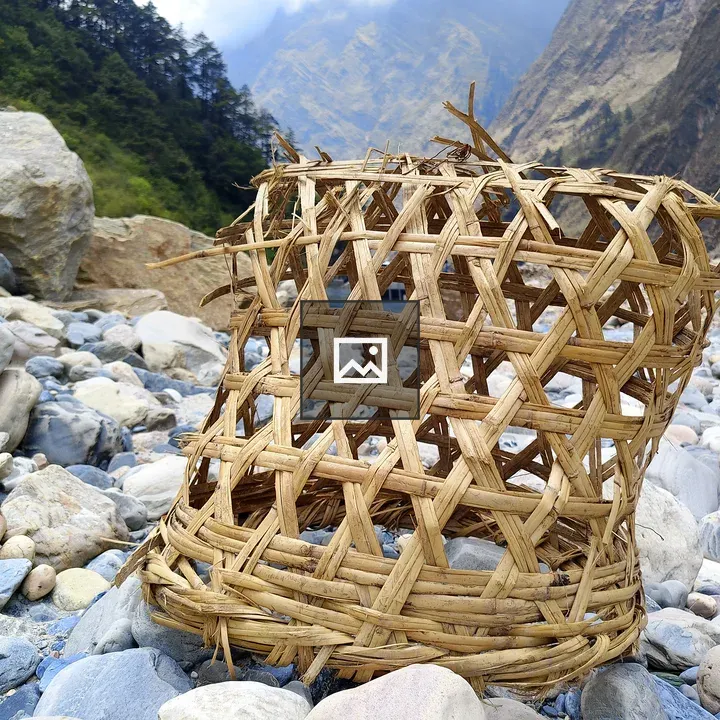 Woven basket on riverbed