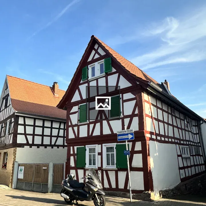 Half-timbered House with Shutters