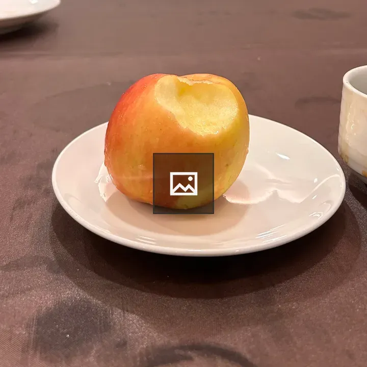 Half-eaten Apple on Plate