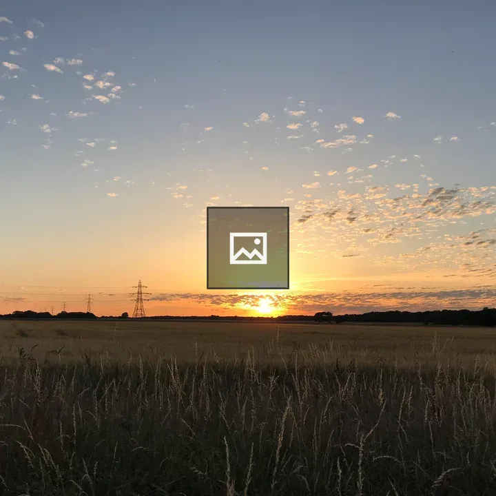 Sunset over field in England