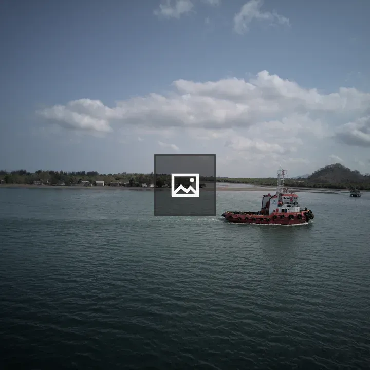 Small ship near harbor
