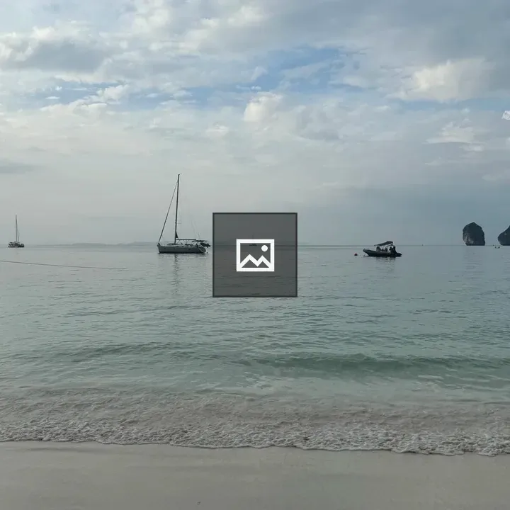 Wide Beach with Sailboats