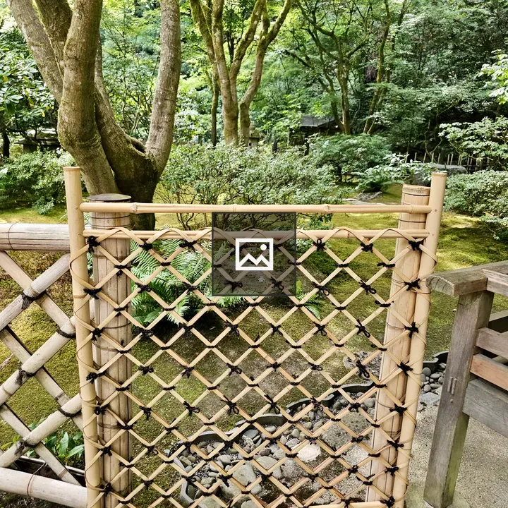 Handcrafted bamboo gate at garden path