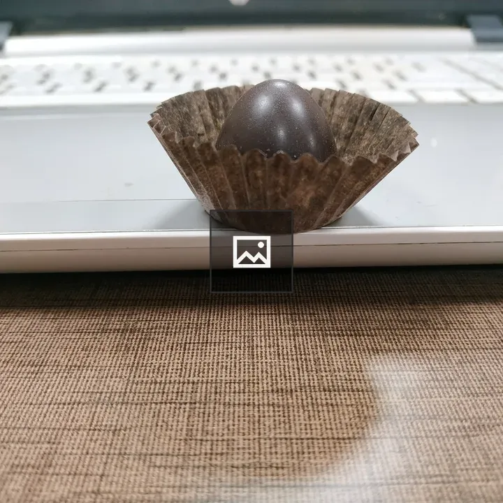 Chocolate candy on laptop
