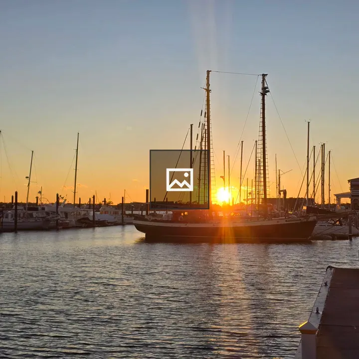 Harbor at Sunset with Sailboats