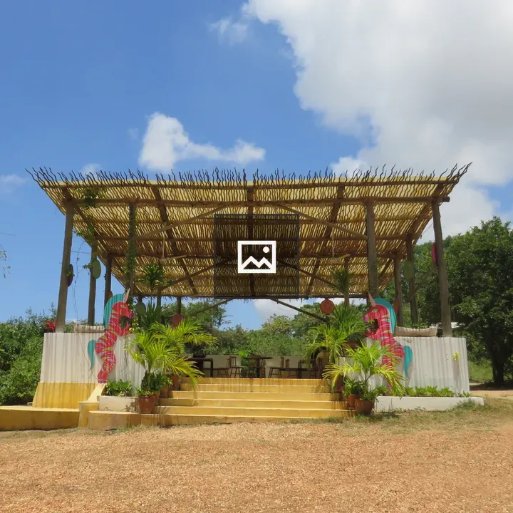 Open-Air Pavilion with Thatched Roof