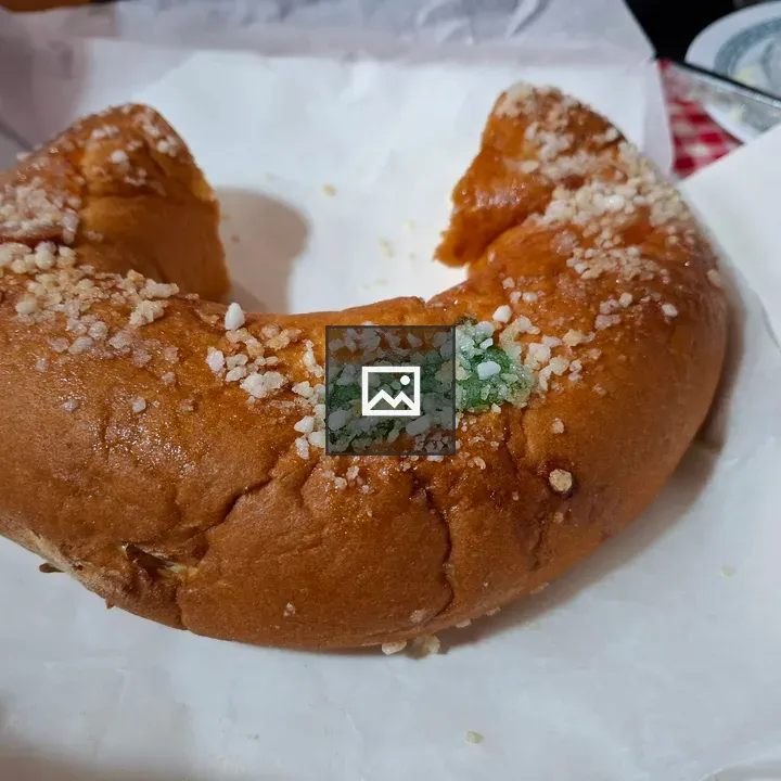 Round sweet bread with sugar