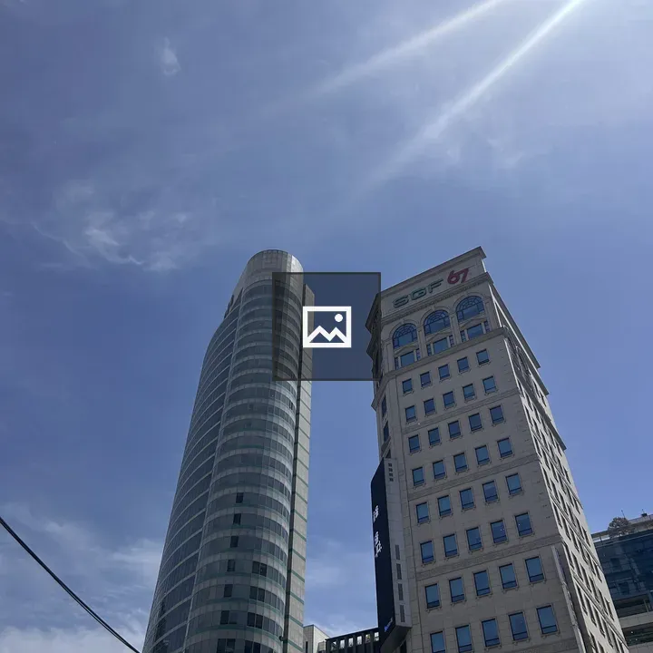 Modern buildings against blue sky