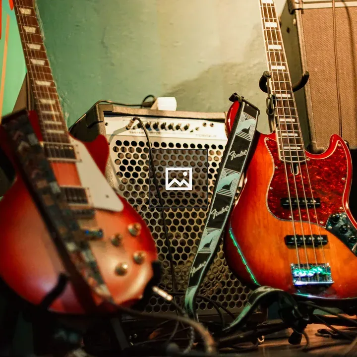 Two electric guitars and amplifier