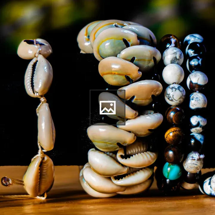 Handcrafted beaded bracelets with cowrie shells