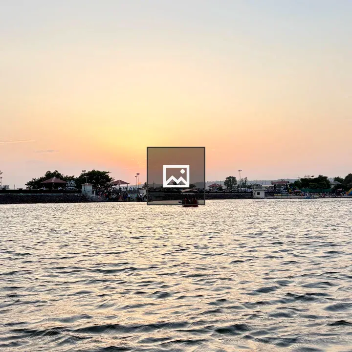 Sunset Over Lakeside Scene