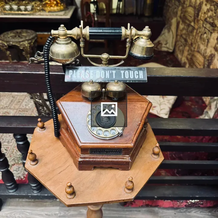 Antique telephone on pedestal