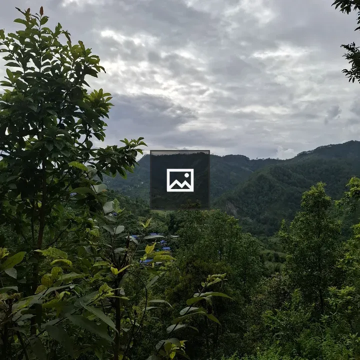 Green Hills Under Cloudy Sky