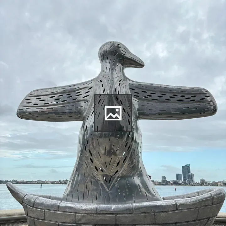 Metal penguin statue in Perth