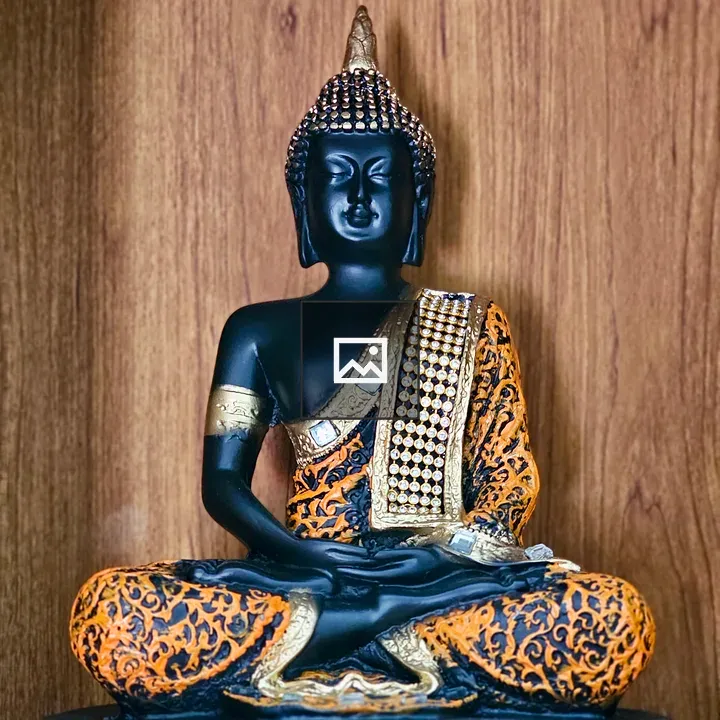 Buddha statue in black and gold