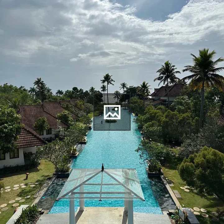 Pool with trees and lake horizon