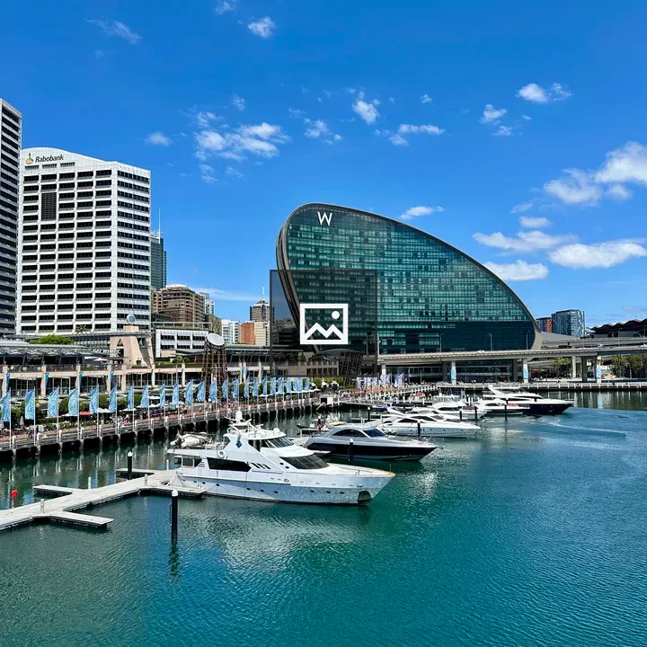 Ships at Harbor with W-Shaped Building
