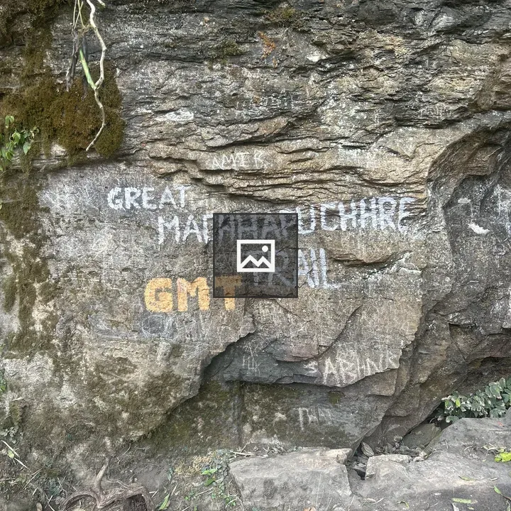 Rock surface with graffiti inscriptions
