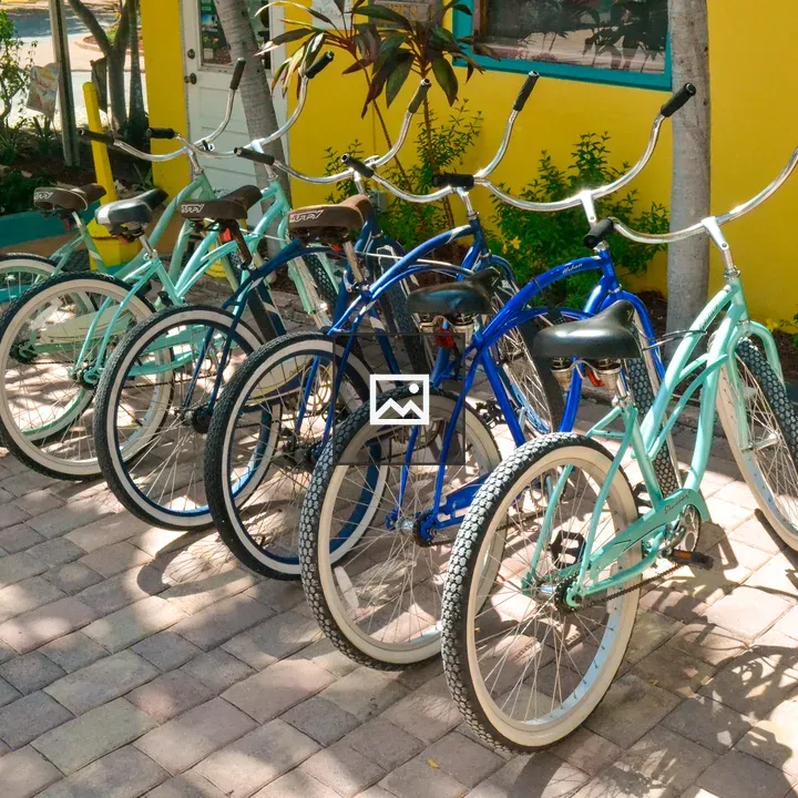 Row of blue and aqua bikes