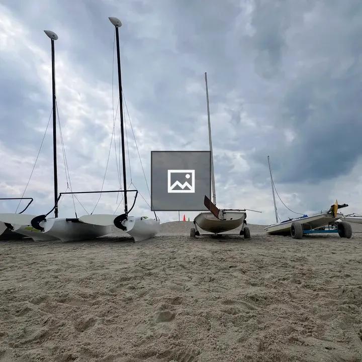 Catamarans and sailboats at Lewes Beach