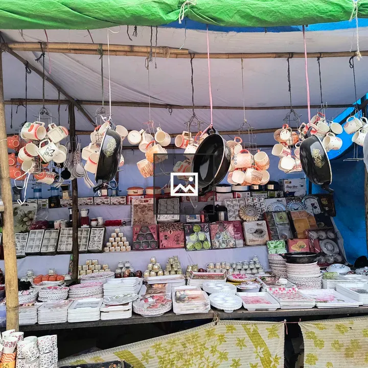 Market scene with cups and plates